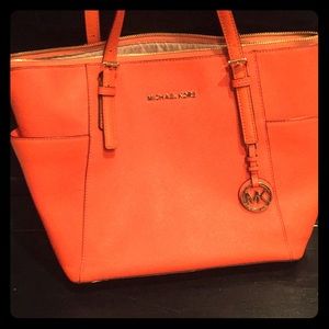 Bright orange Michael Kors tote